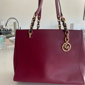 Michael Kors deep red handbag with tortoise gold hardware